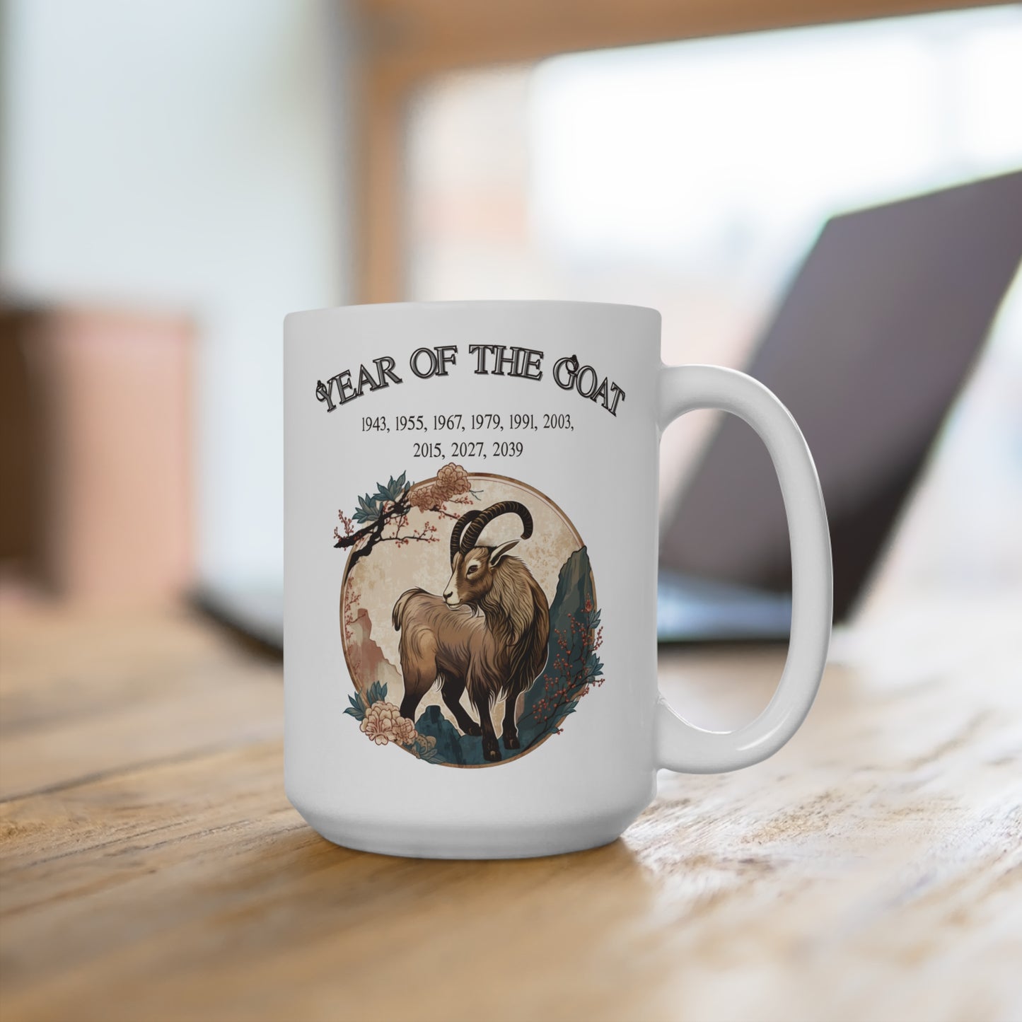 White mug with a goat illustration and text on a wooden surface