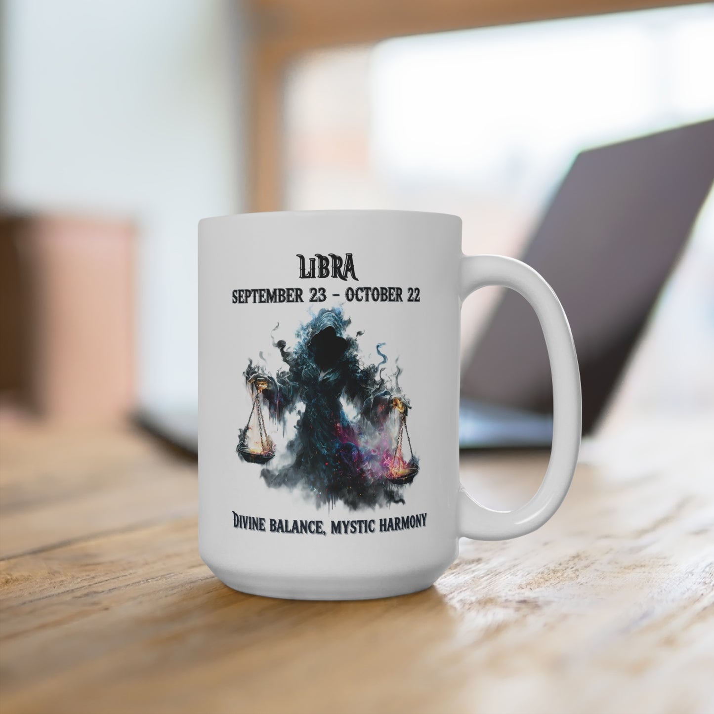 White mug with Libra zodiac design on a wooden surface