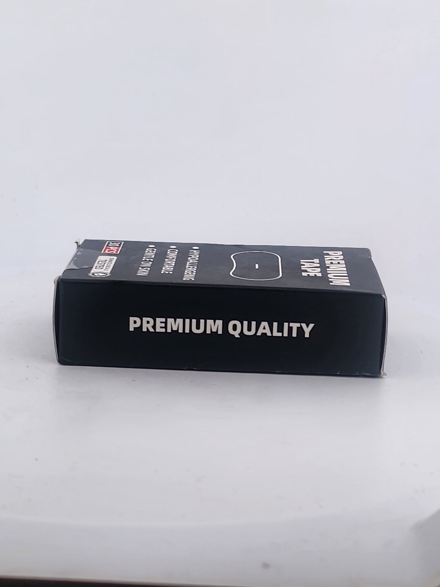 Black box with 'Premium Quality' text on a white background