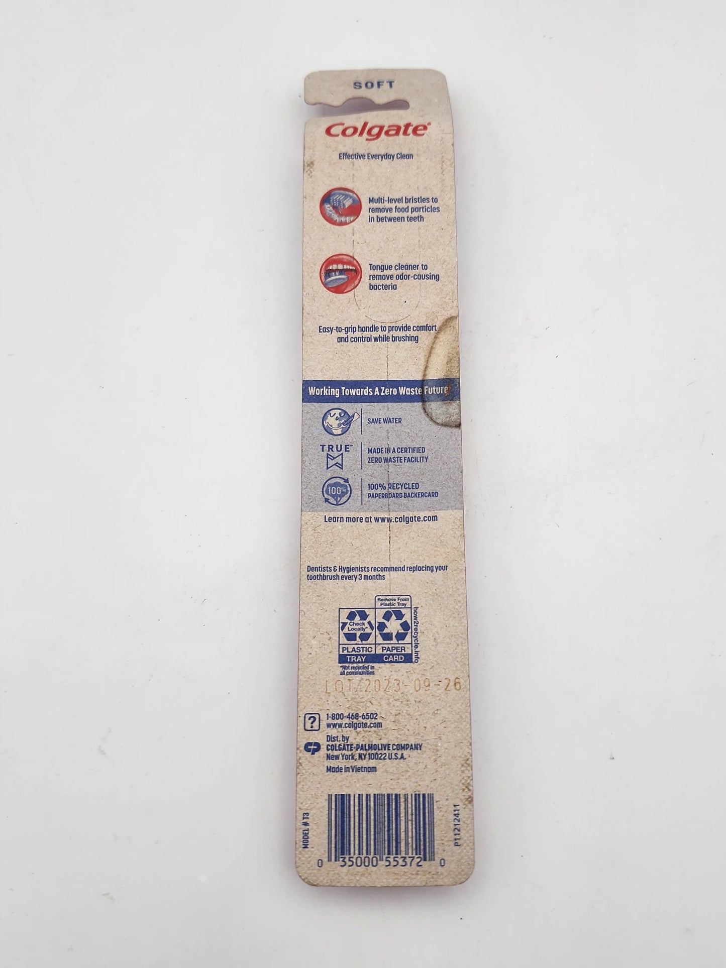 Colgate toothbrush packaging on a white background