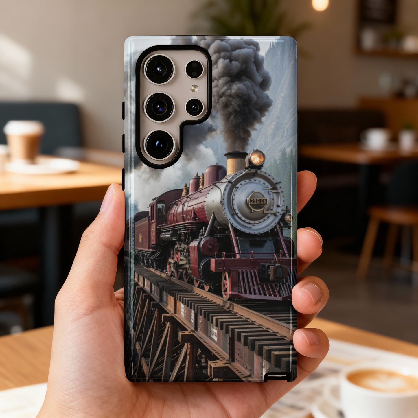 Smartphone case featuring a vintage steam train crossing a wooden trestle bridge.