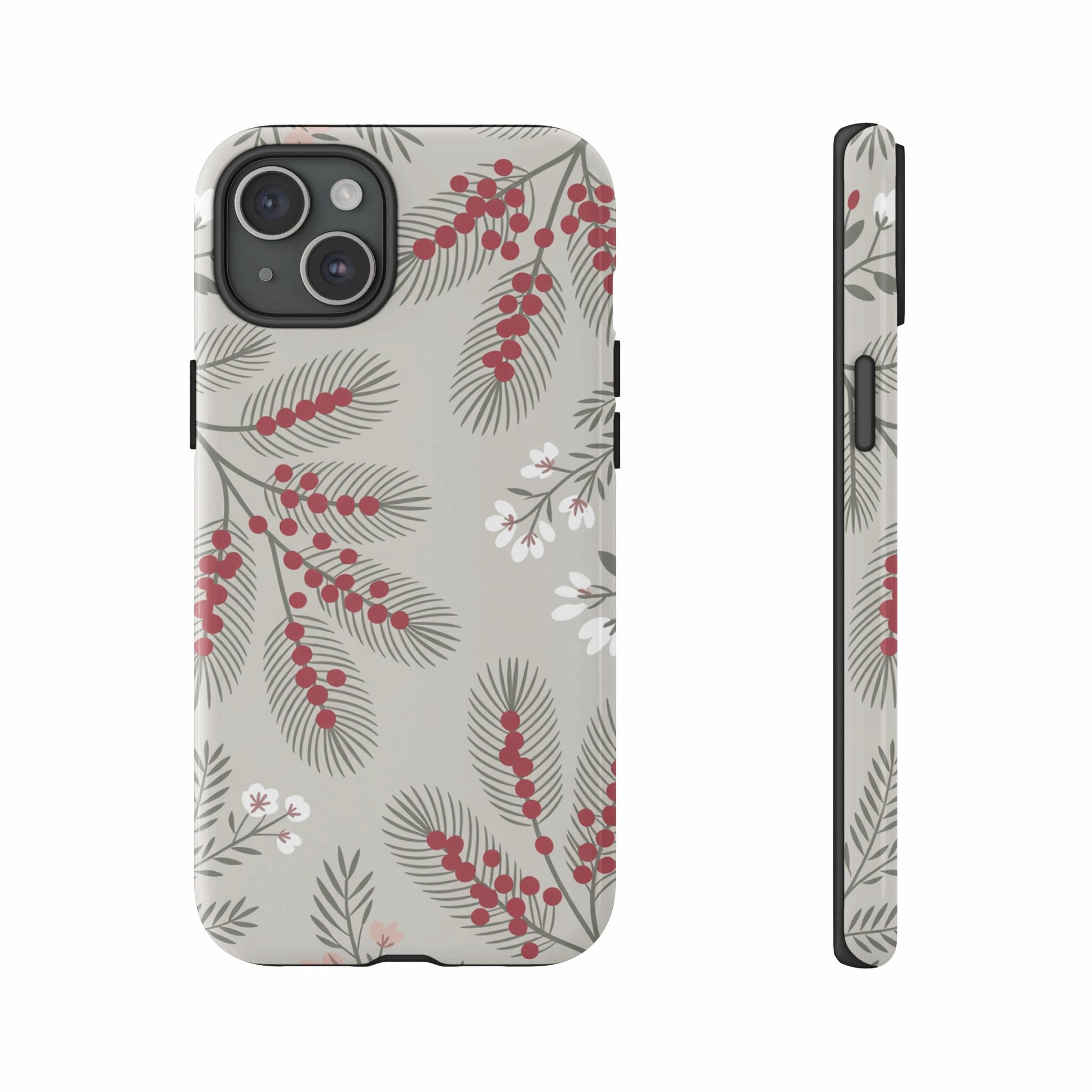 iPhone case with red berries and pine needles on a beige background.