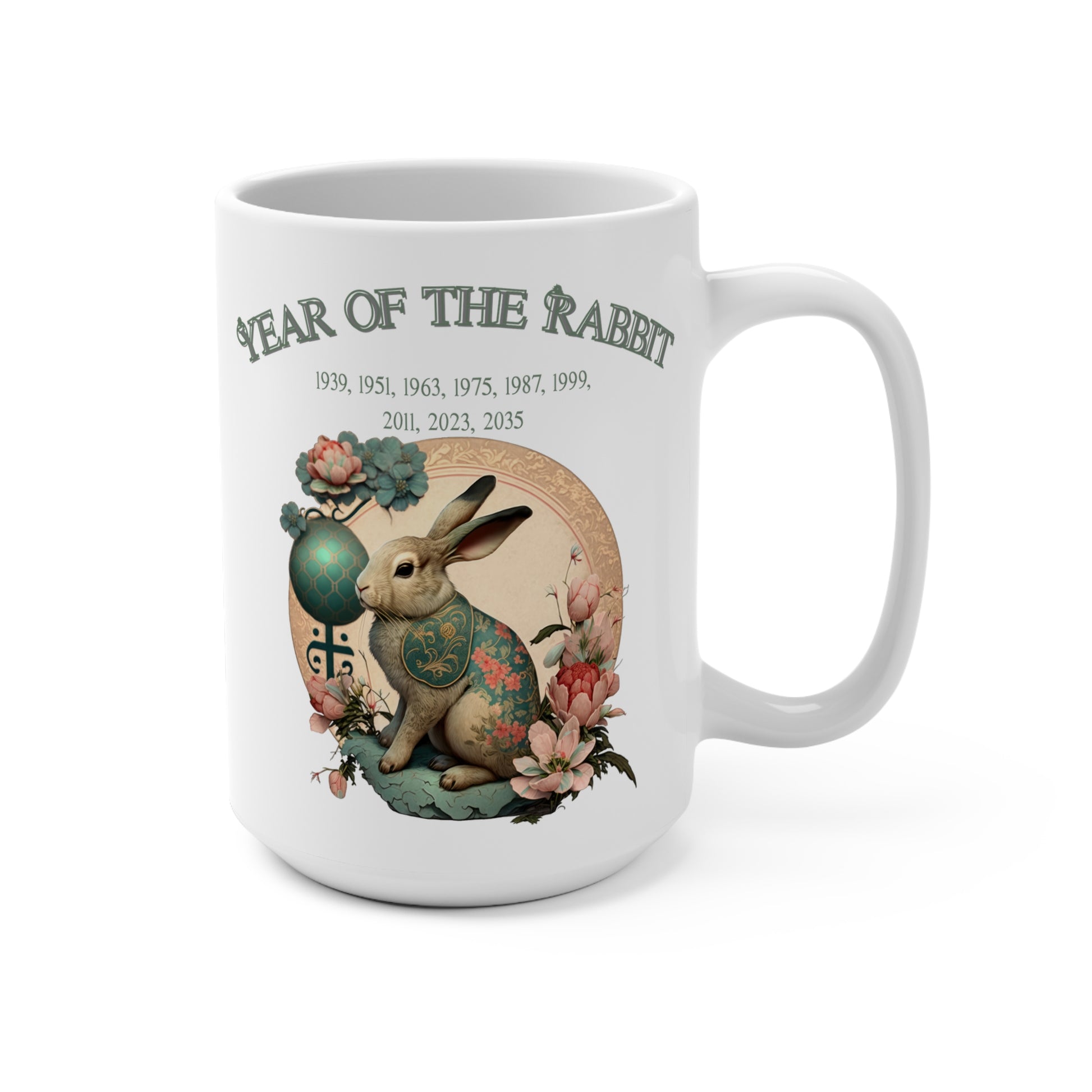 White mug with Year of the Rabbit design featuring a rabbit and decorative elements on a white background.