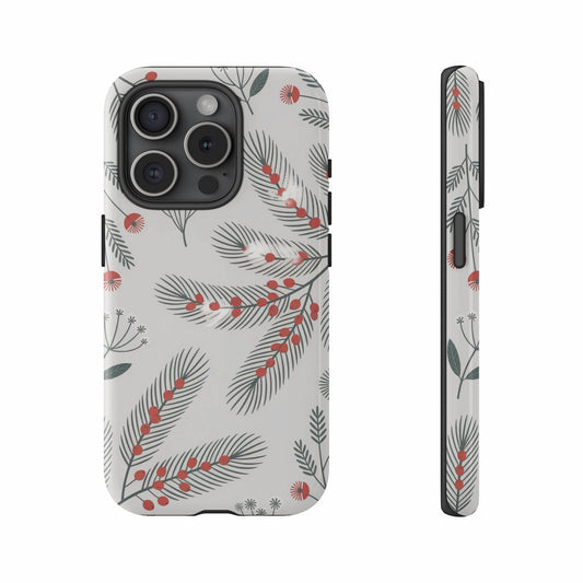 Phone case with a festive green pine branch and red berry pattern.