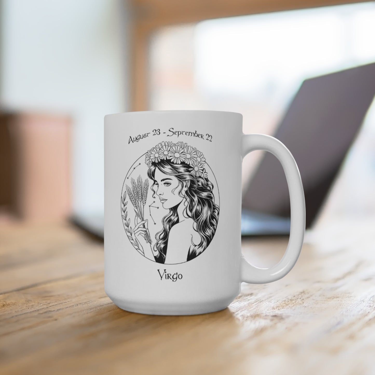 White mug with Virgo zodiac design on a wooden surface