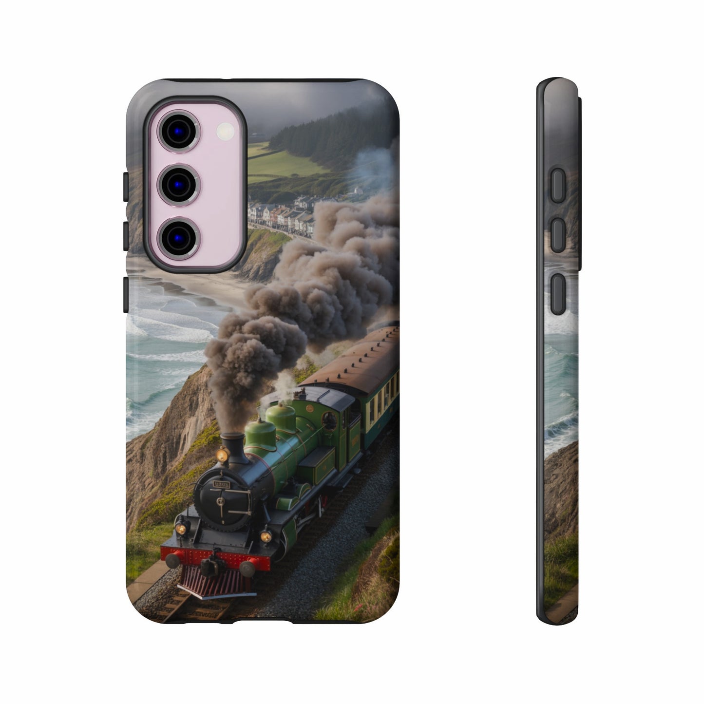 Green steam train on a coastal track with smoke billowing.