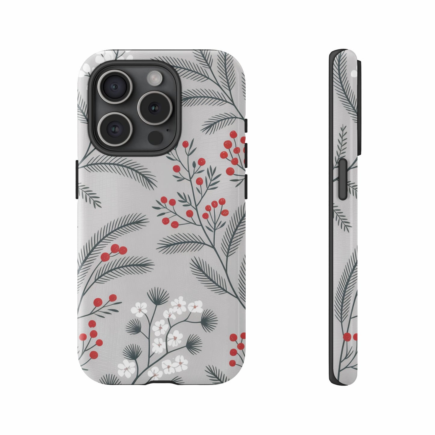 Two iPhone cases with a white and red berry and leaf pattern on a grey background.