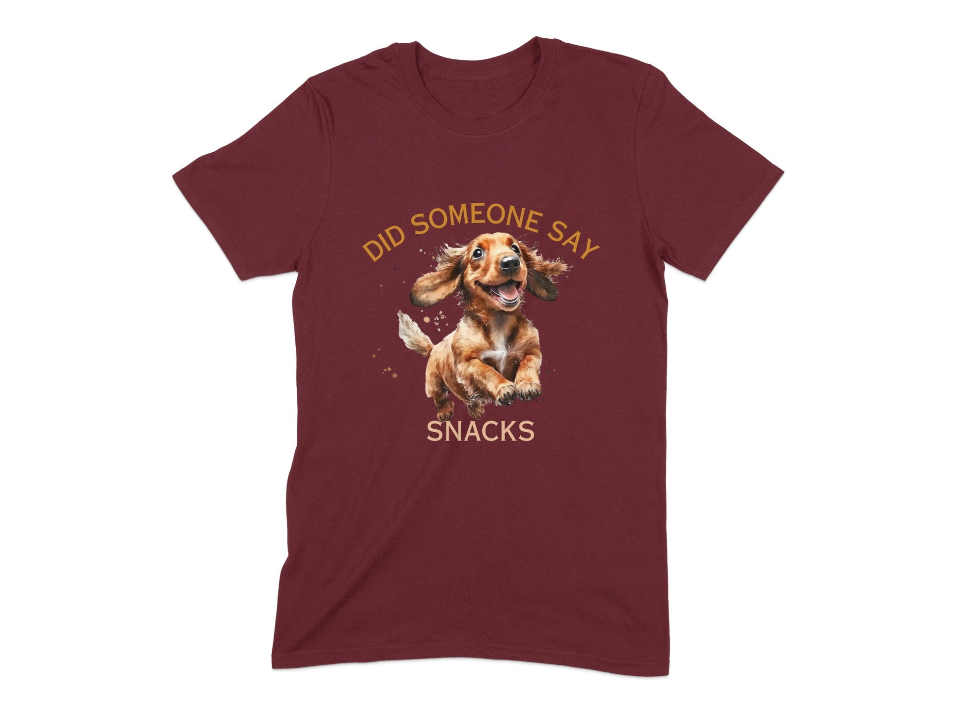 Maroon t-shirt with a cartoon dachshund jumping and text "DID SOMEONE SAY SNACKS".