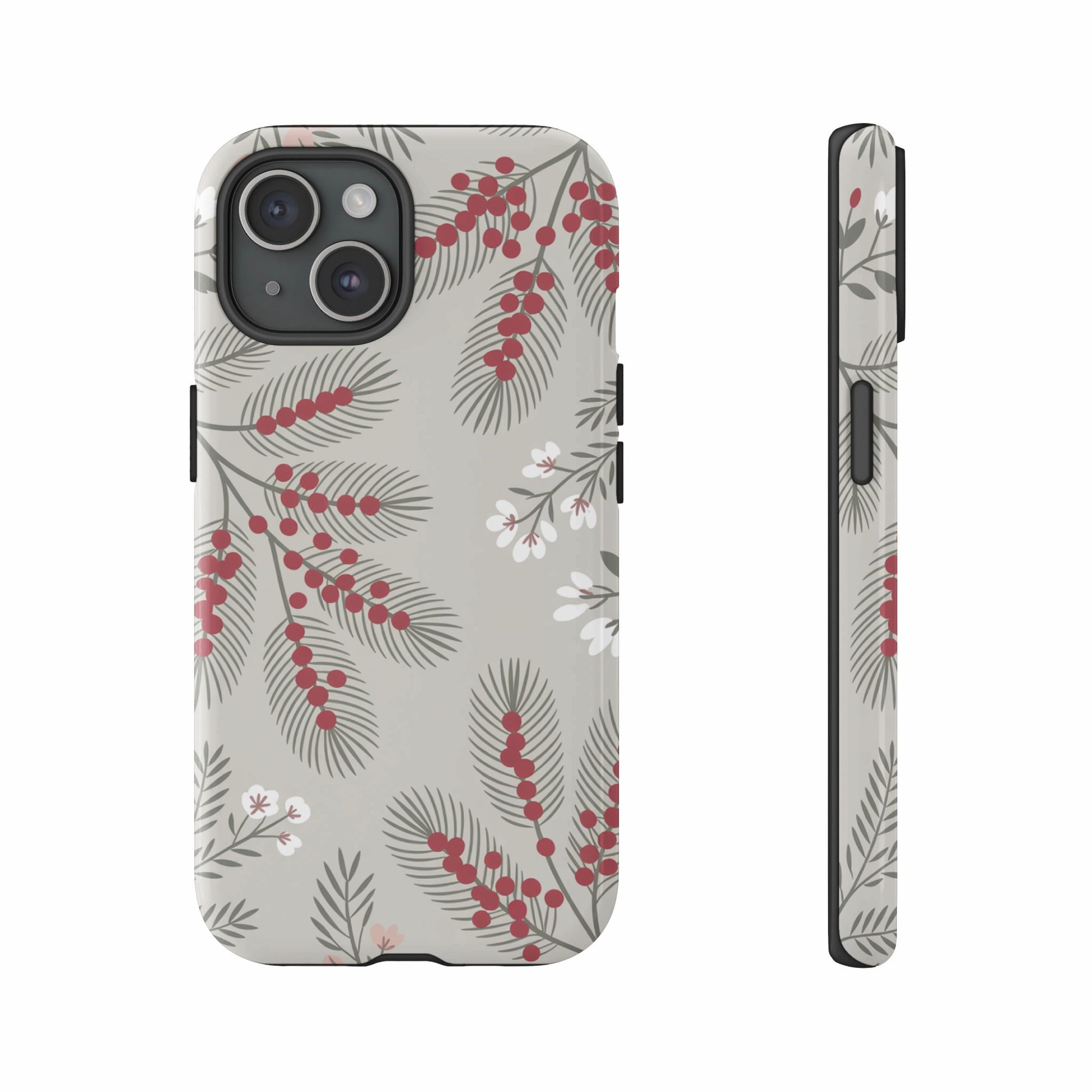 Phone case with a red berry and green pine branch pattern on a light background.