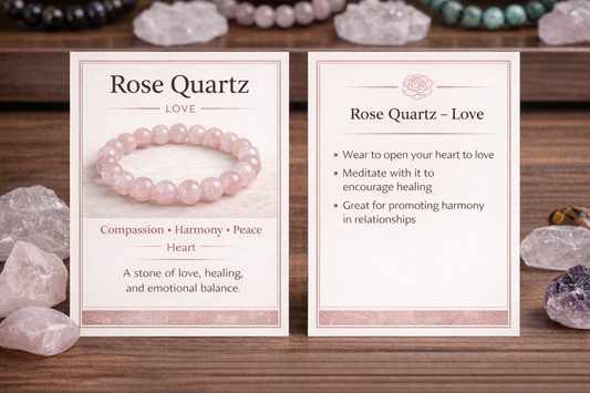 Rose Quartz bracelet with informational cards on a wooden surface with crystals.