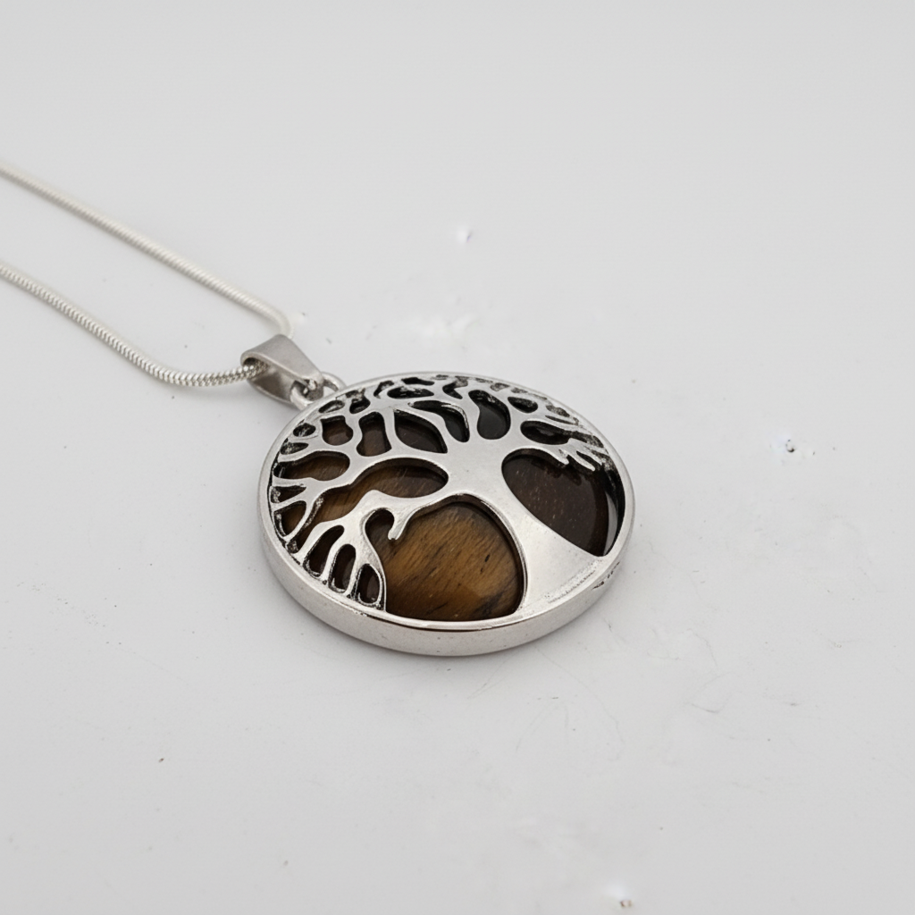 Tree of Life tiger eye necklace shown at 45-degree angle highlighting golden-brown banding and silver Tree of Life design