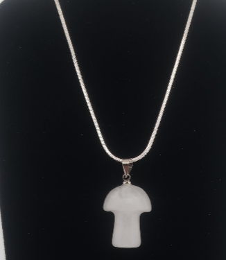 Necklace with a white mushroom-shaped pendant on a black background