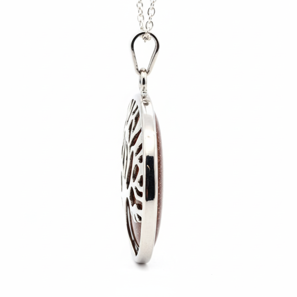 Side profile of Tree of Life goldstone necklace showing pendant depth and silver-plated chain