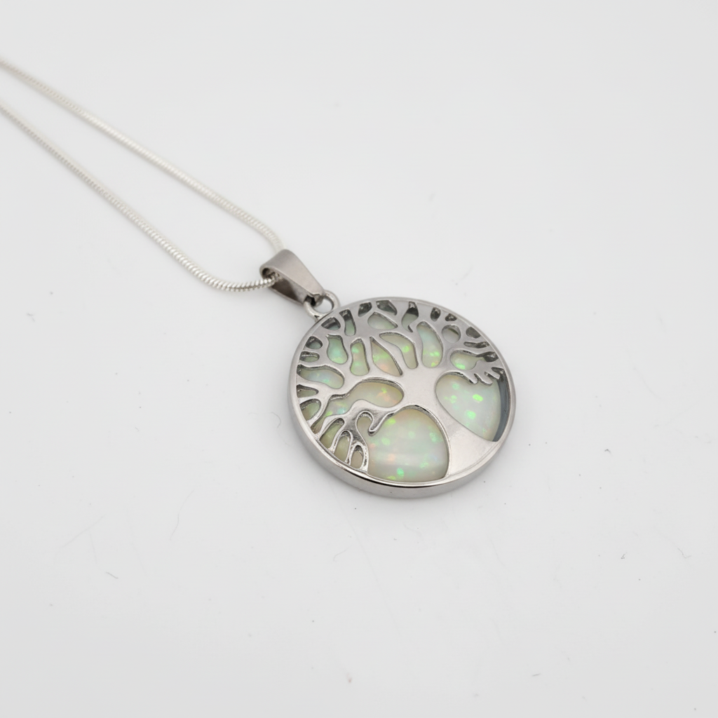 Tree of Life opal necklace shown at 45-degree angle highlighting luminous white opal and silver Tree of Life design