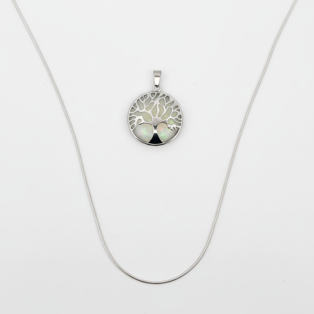 Top-down view of Tree of Life opal pendant showing circular iridescent stone and intricate silver branches