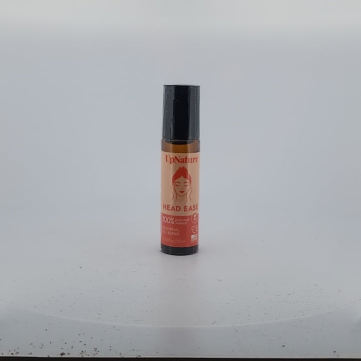 Small cylindrical object with a label on a white surface
