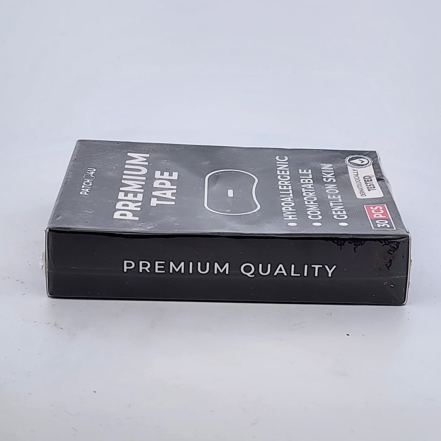 Box of premium tape on a white background