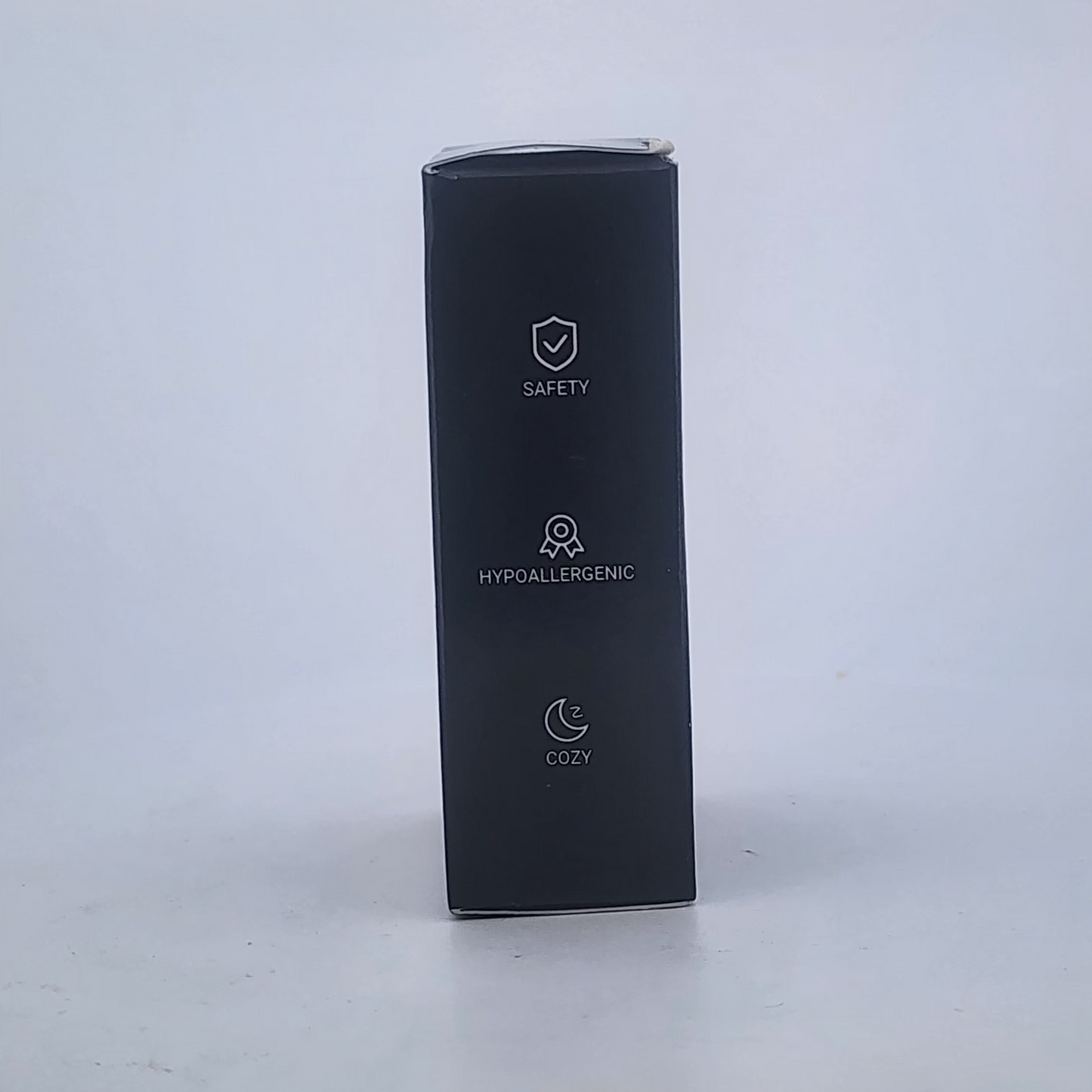 Black rectangular product box with text on a white background