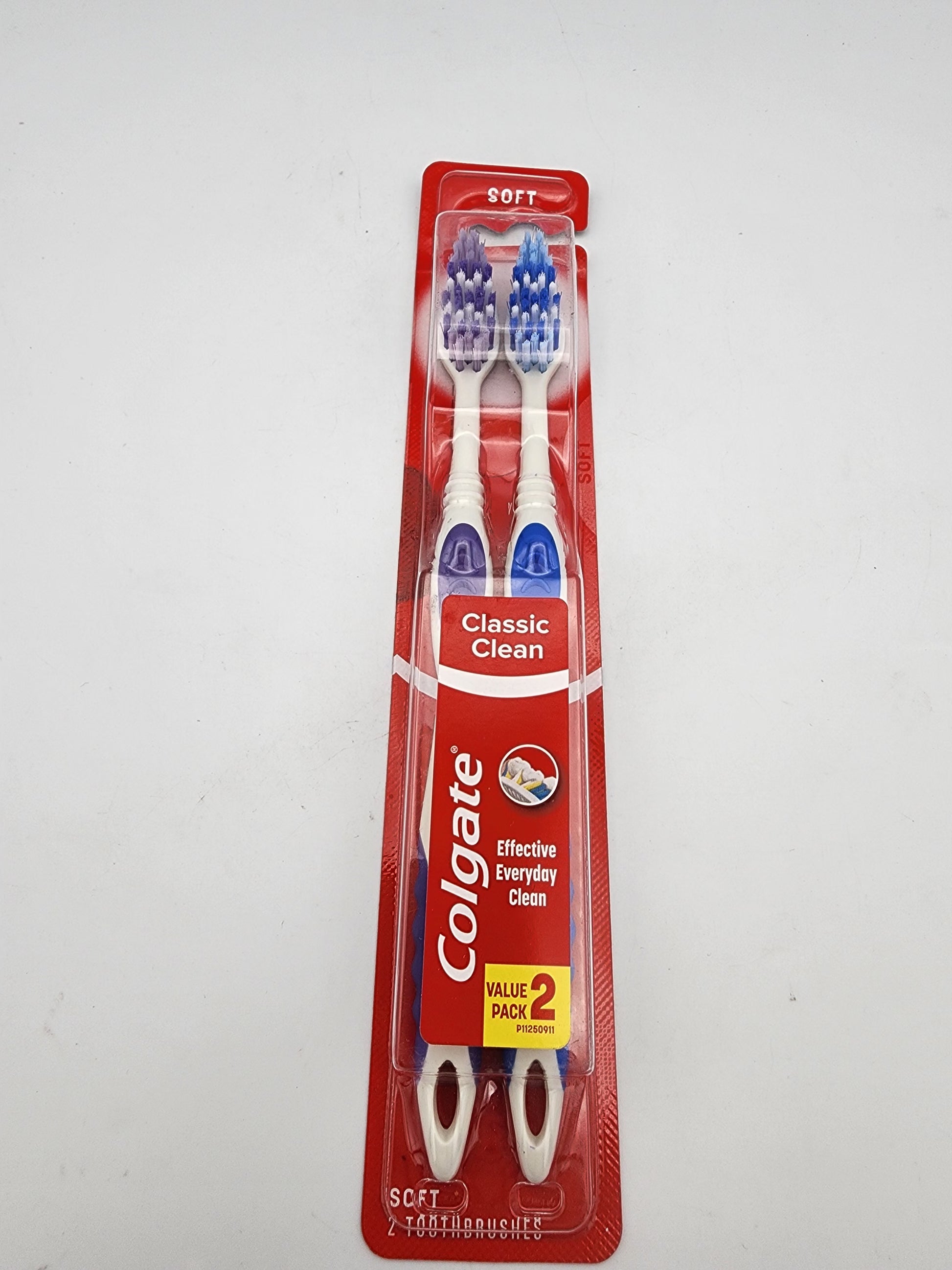 Colgate toothbrushes in a red packaging on a white background