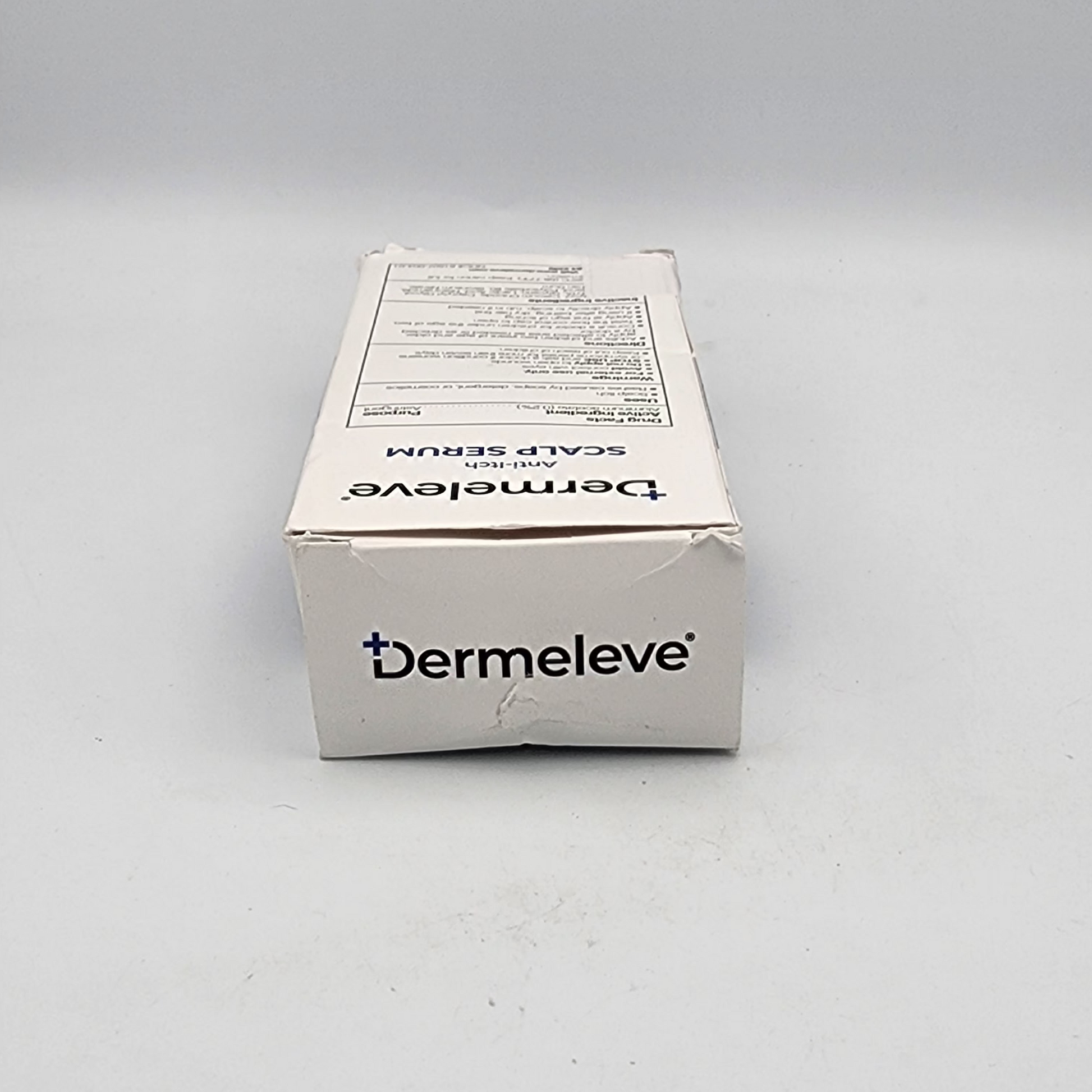 Dermeleve product packaging on a gray background