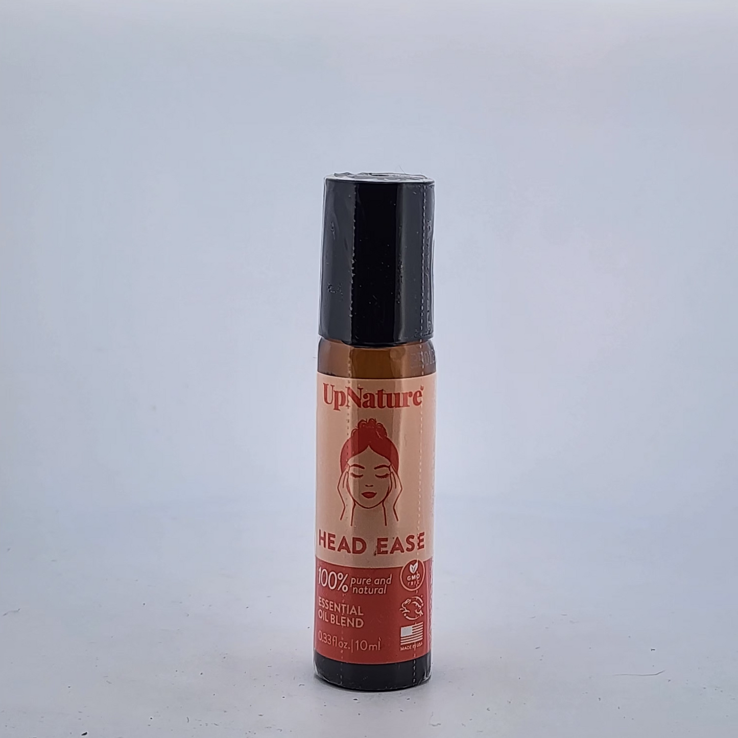 Roll-on bottle with red label featuring a face on a white background