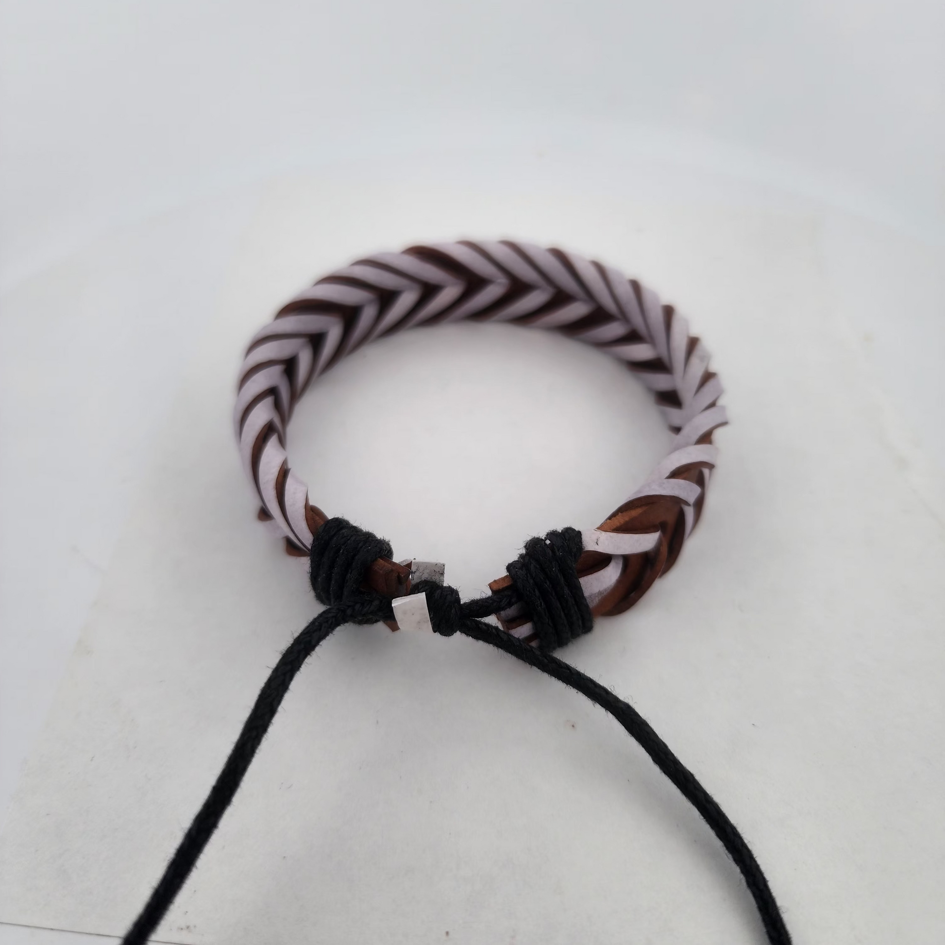 Bracelet with braided design on a white background