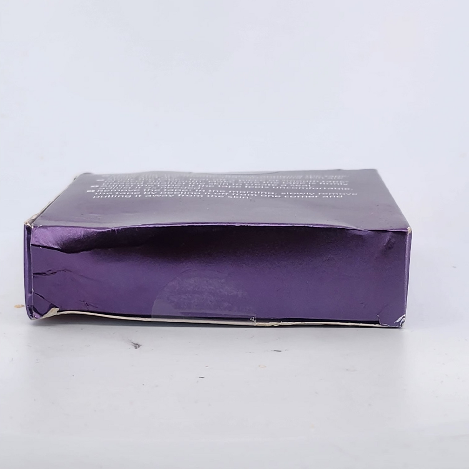 Purple box on a white surface