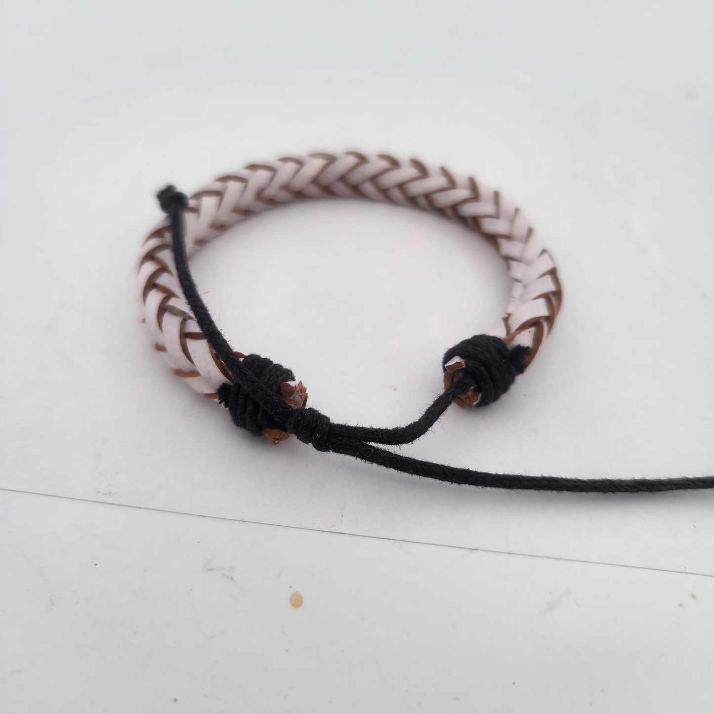 Bracelet with braided design on a white background