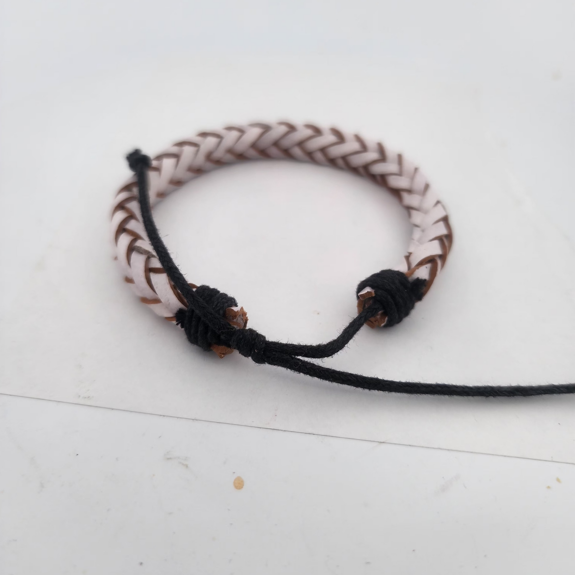 Bracelet with braided design on a white background