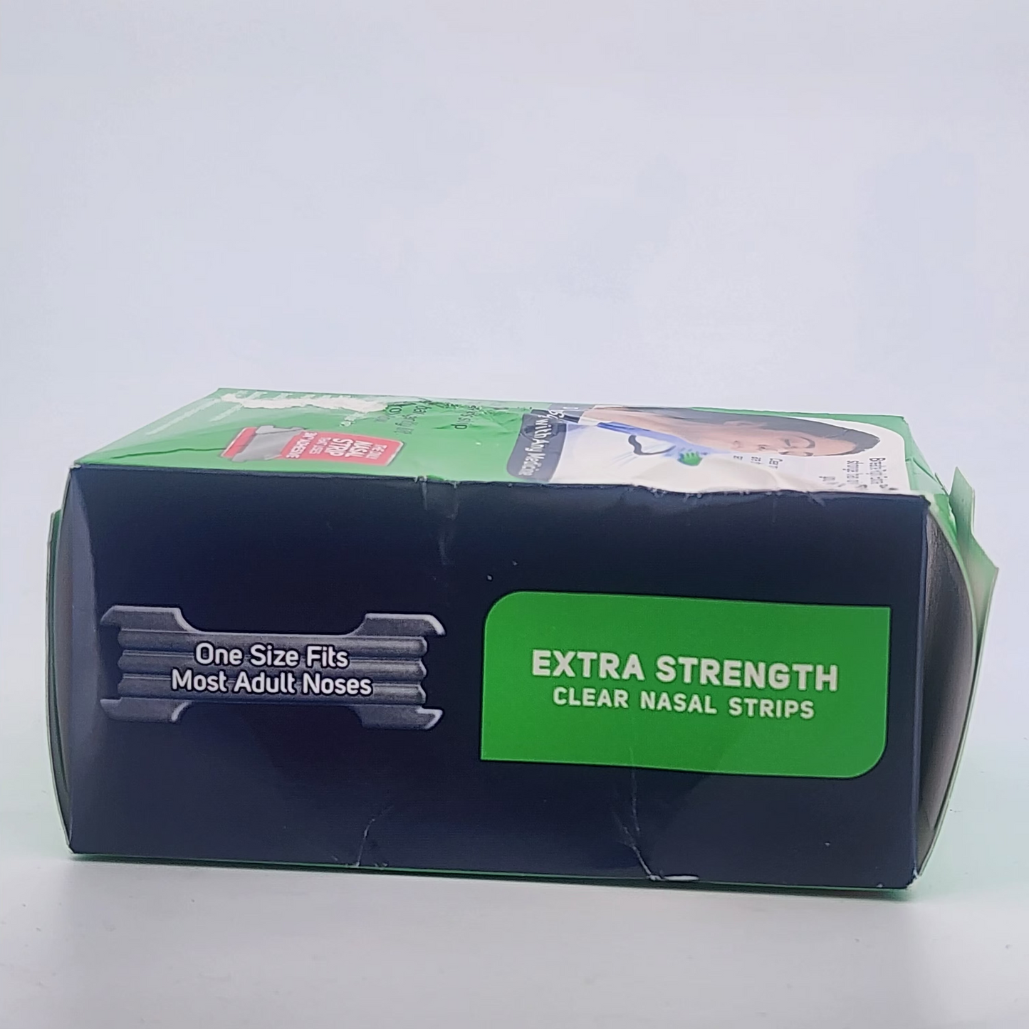 Box of Extra Strength Clear Nasal Strips on a white background