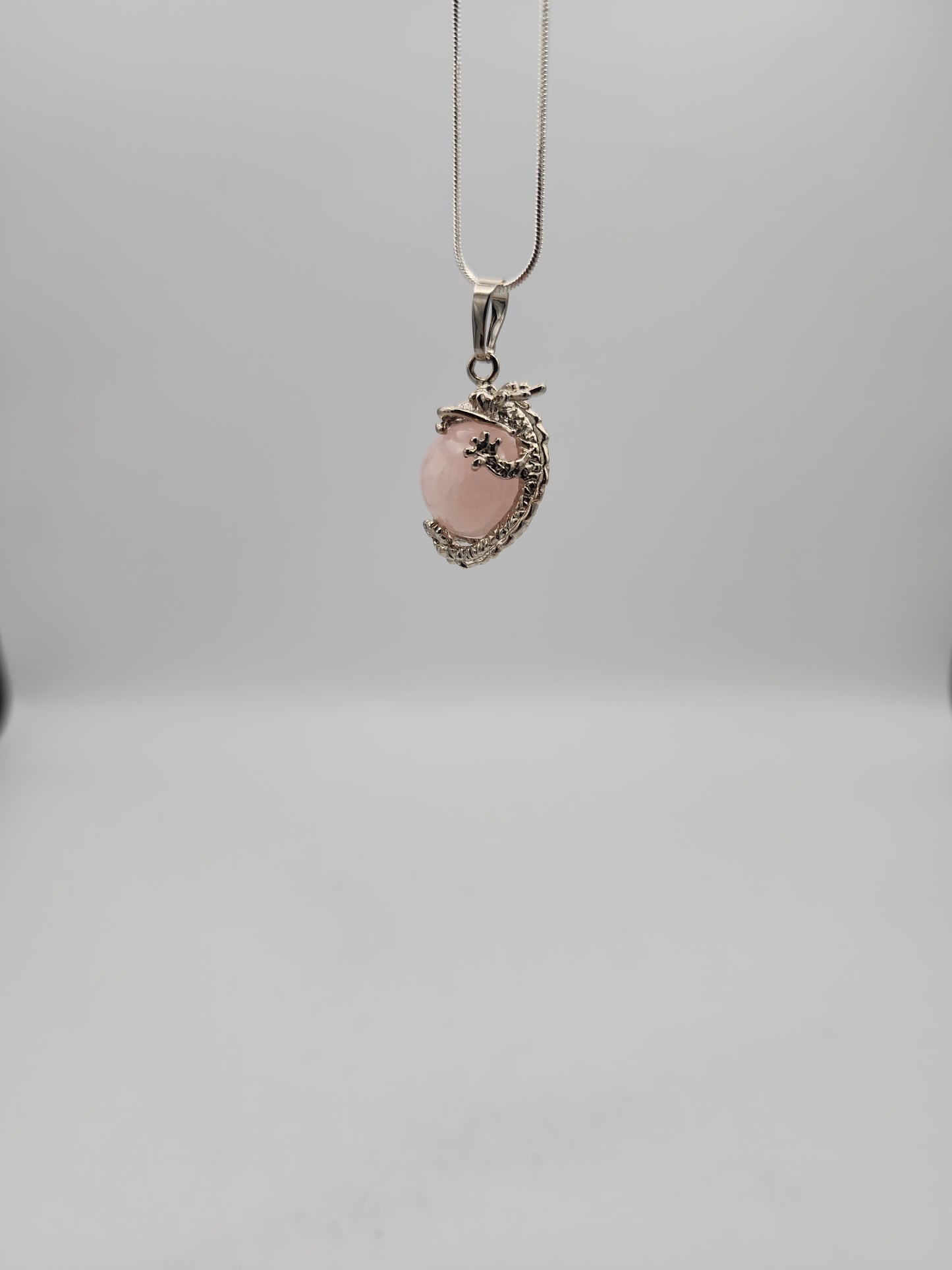Necklace with a pendant on a light gray background