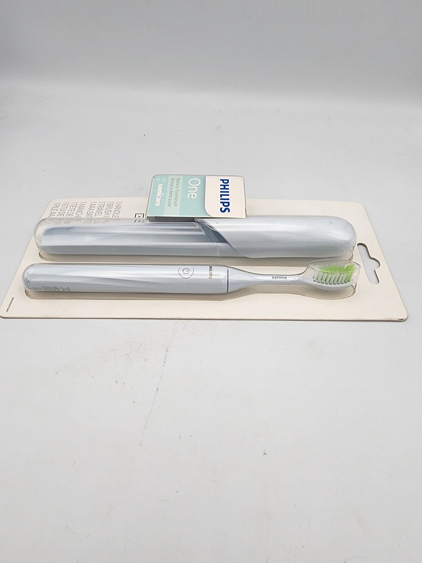 Two electric toothbrushes on a white background with Philips branding.