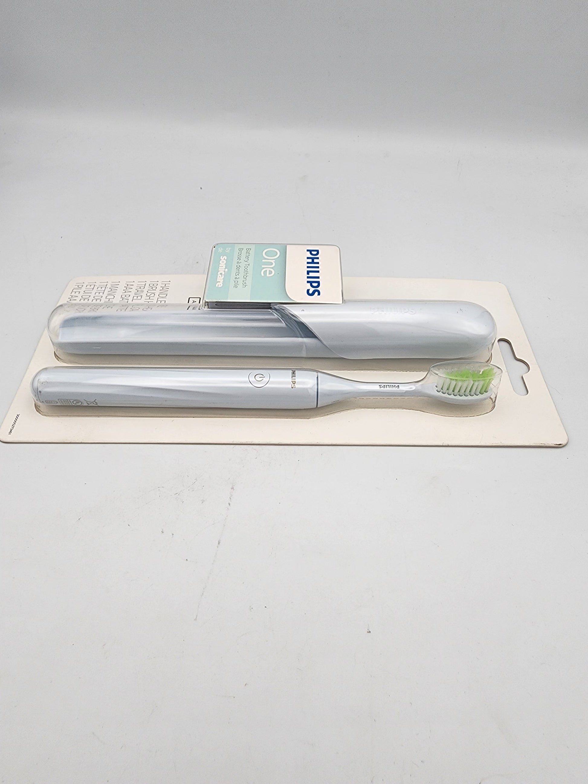 Two electric toothbrushes on a white background with Philips branding.