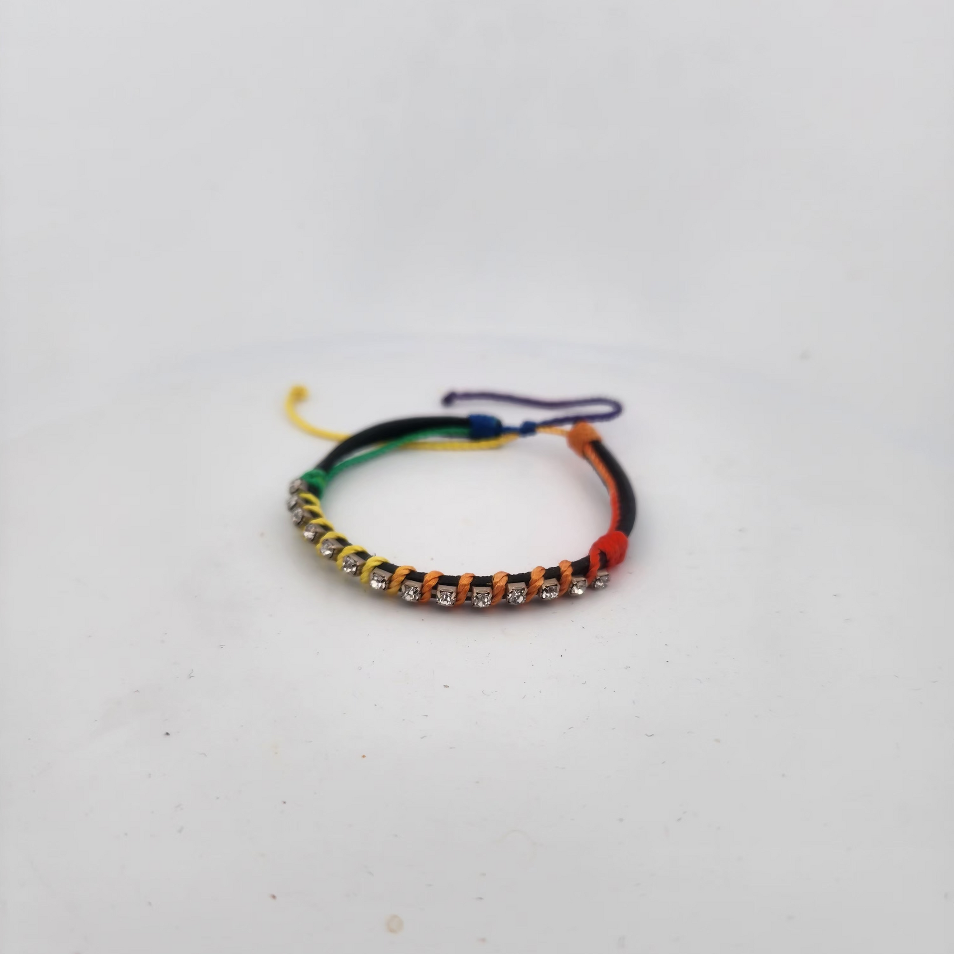 Multicolored beaded bracelet on a white background