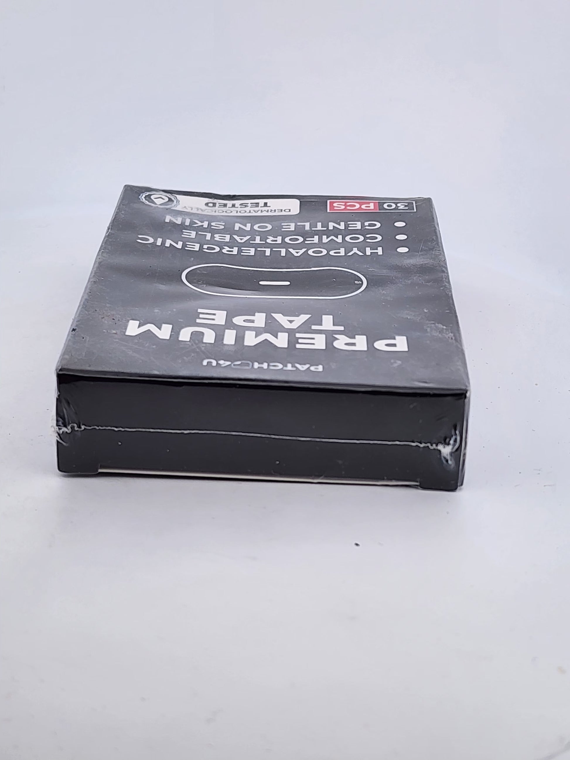 Box of premium tape on a white background