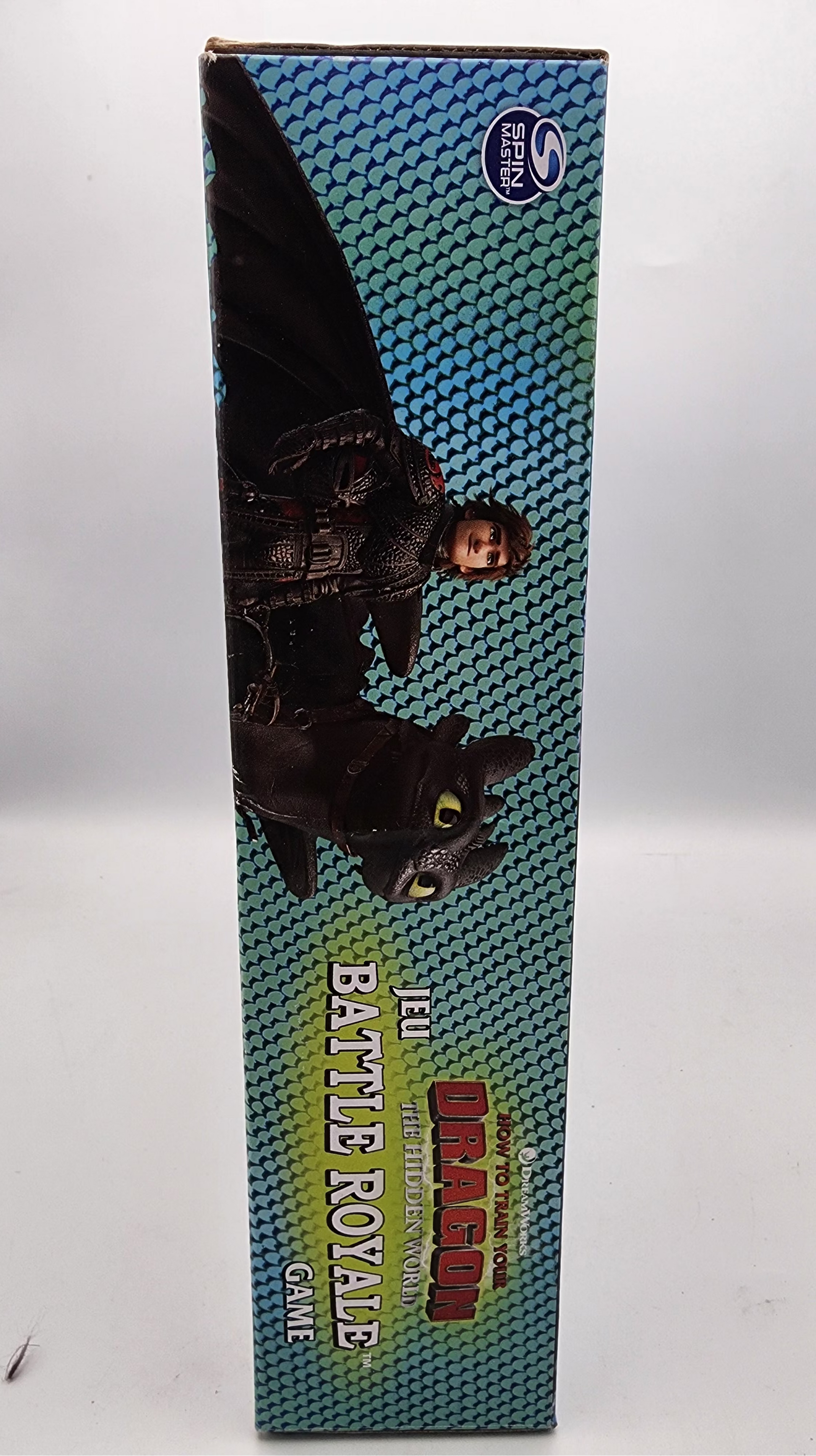 Toy figure in a box with 'Battle Royale' text on a white background