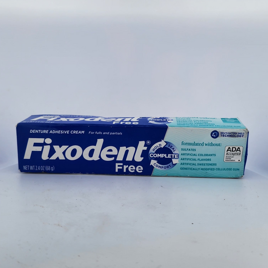 Box of Fixodent Free denture adhesive cream on a white background