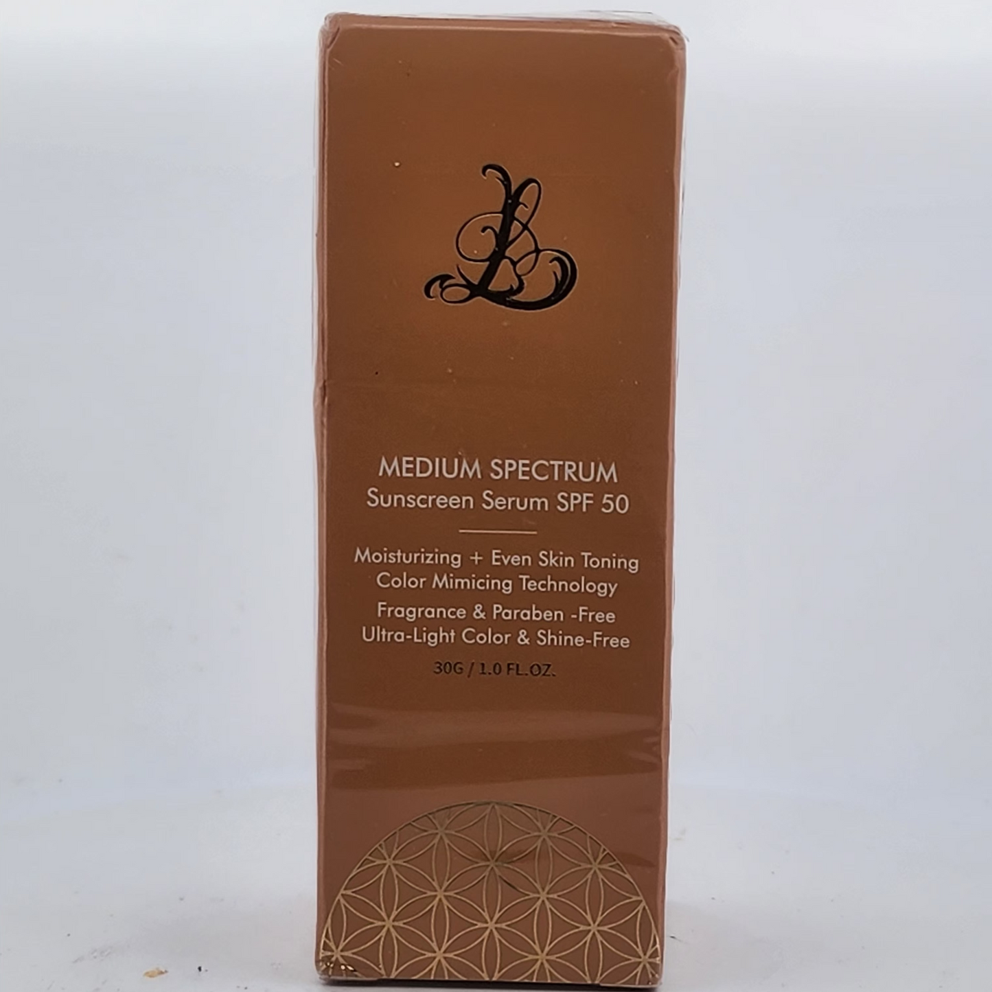 Brown box of medium spectrum sunscreen serum SPF 30 on a white background