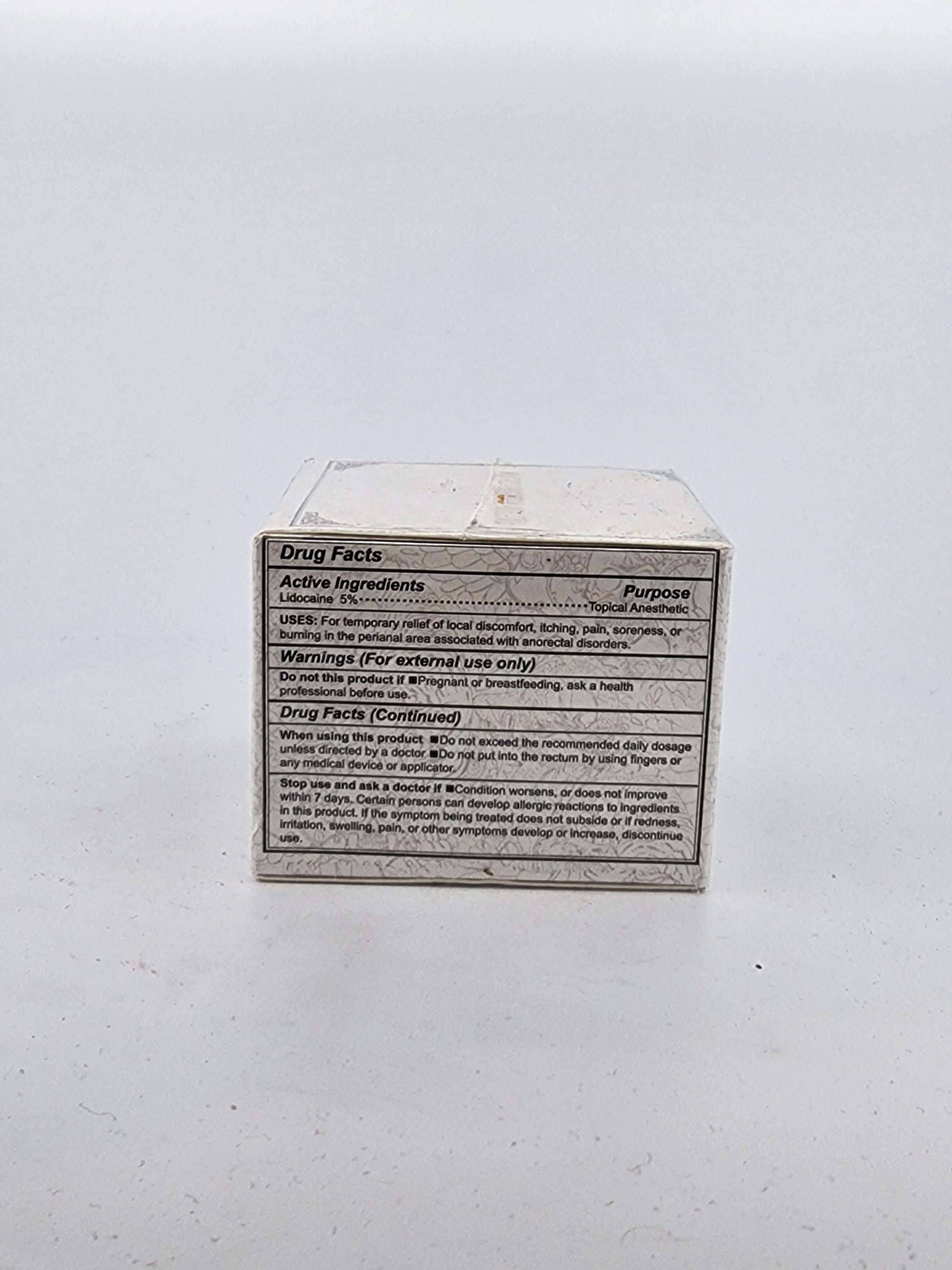 Rectangular metal box with text on a white background