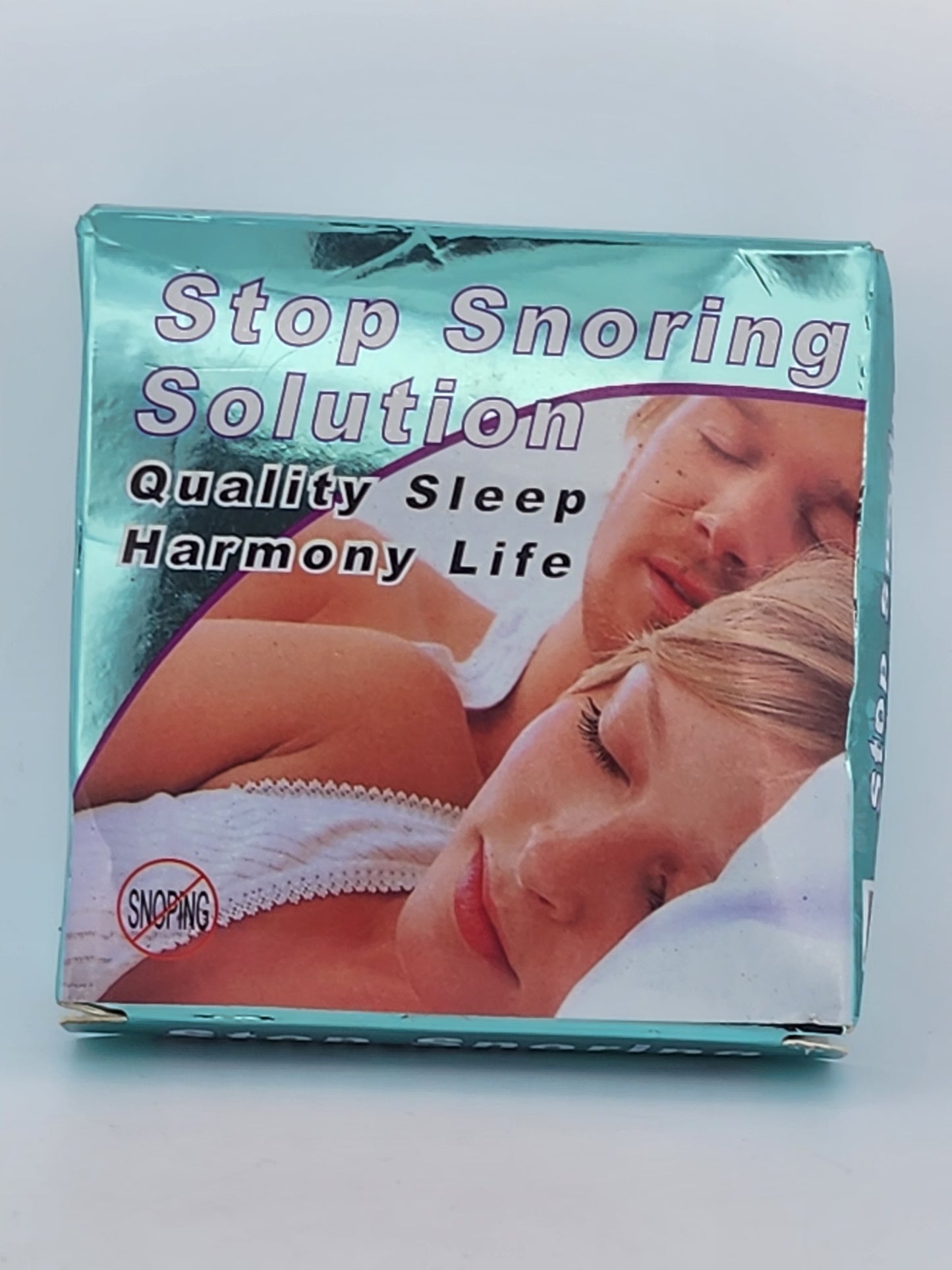 Product packaging for 'Stop Snoring Solution' with images of a couple and text on a light blue background.