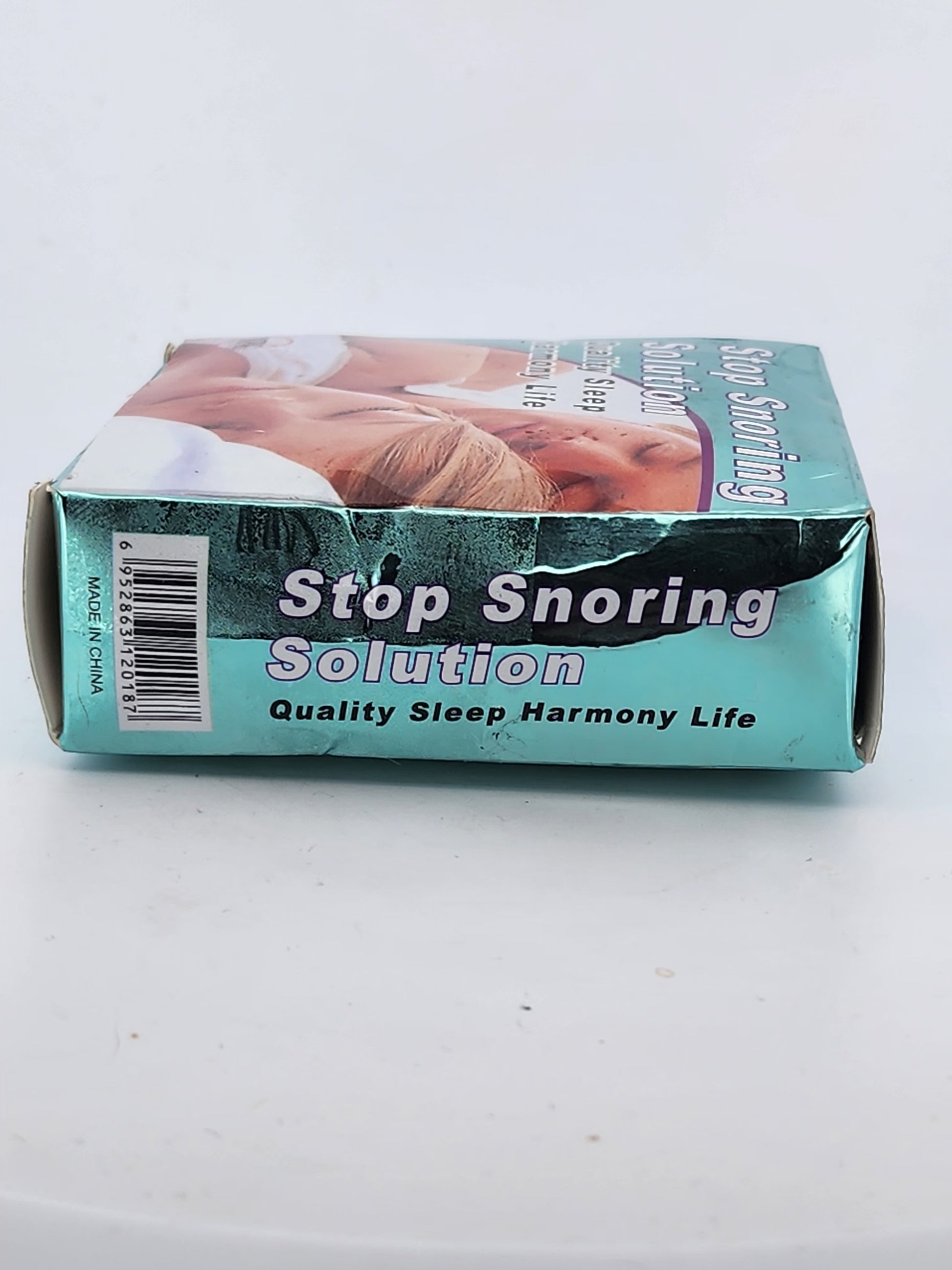 Product packaging for 'Stop Snoring Solution' on a white background