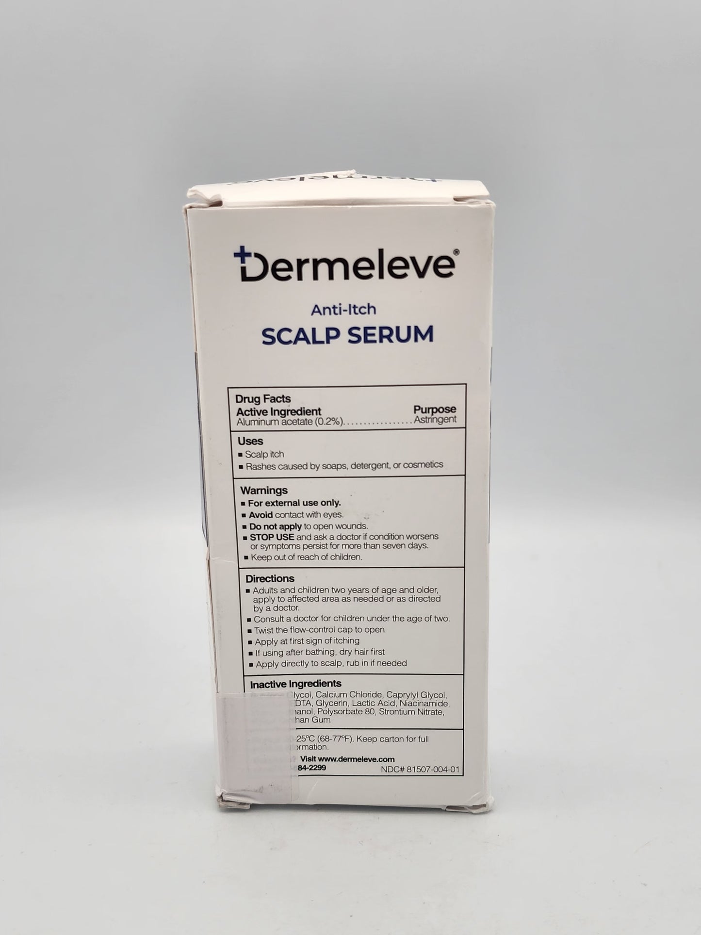 Dermeleve Anti-Itch Scalp Serum packaging on a gray background