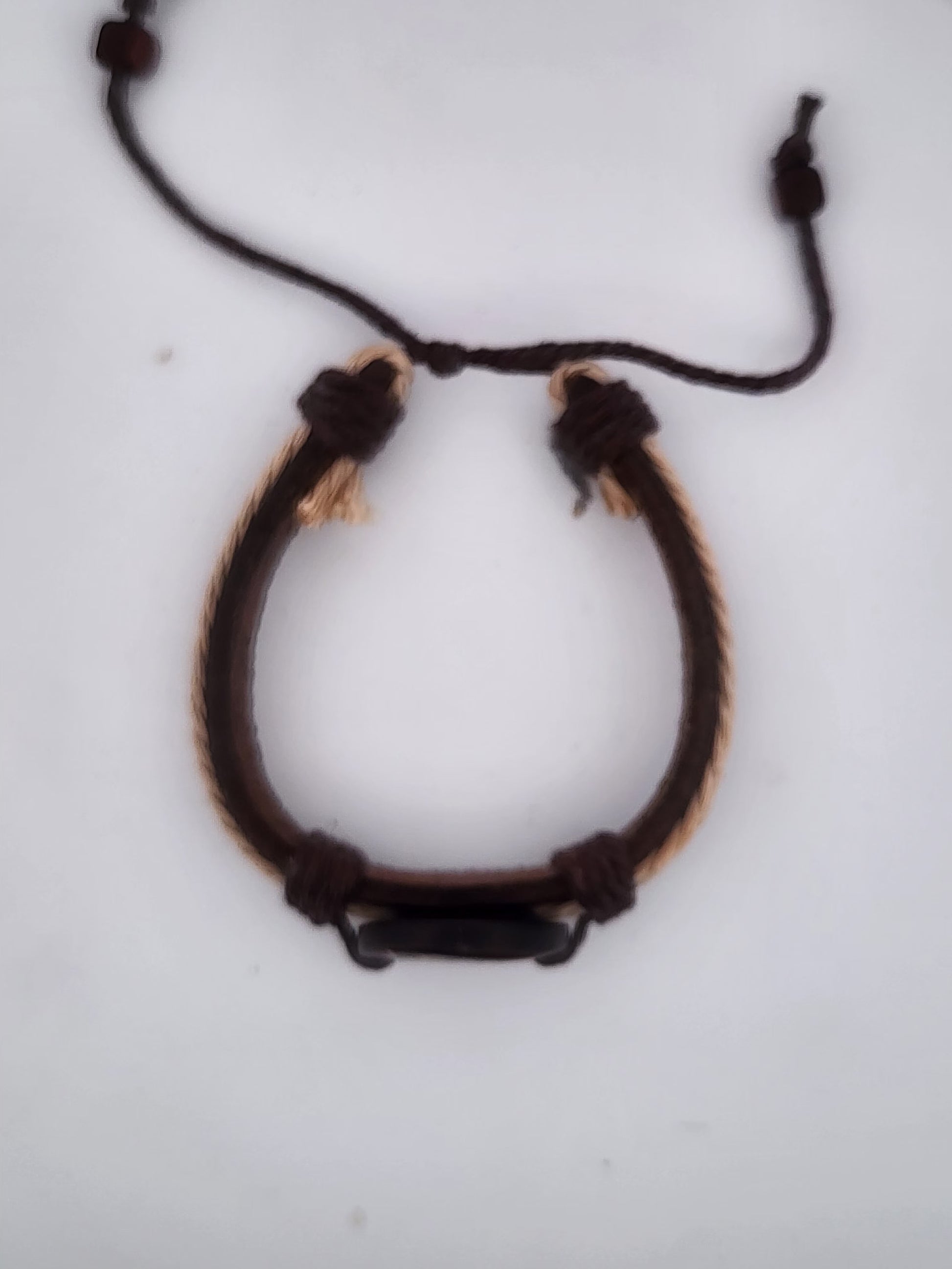 Bracelet with braided design on a white background