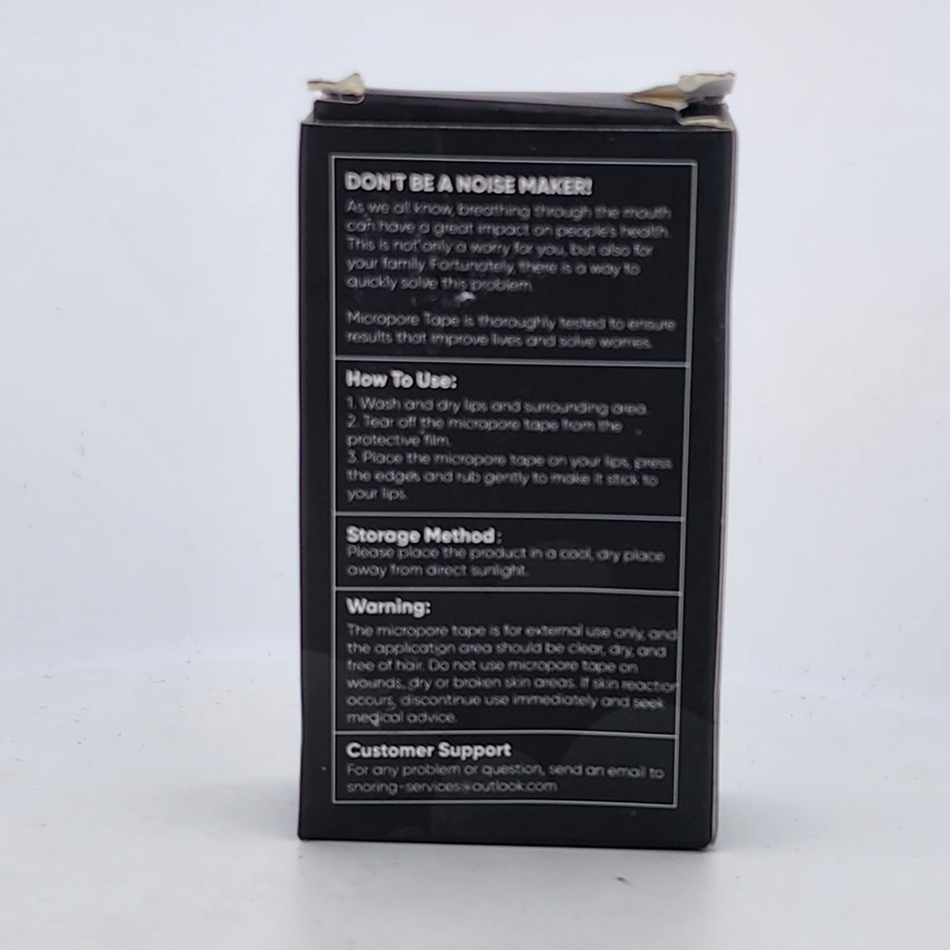 Black box with white text on a white background