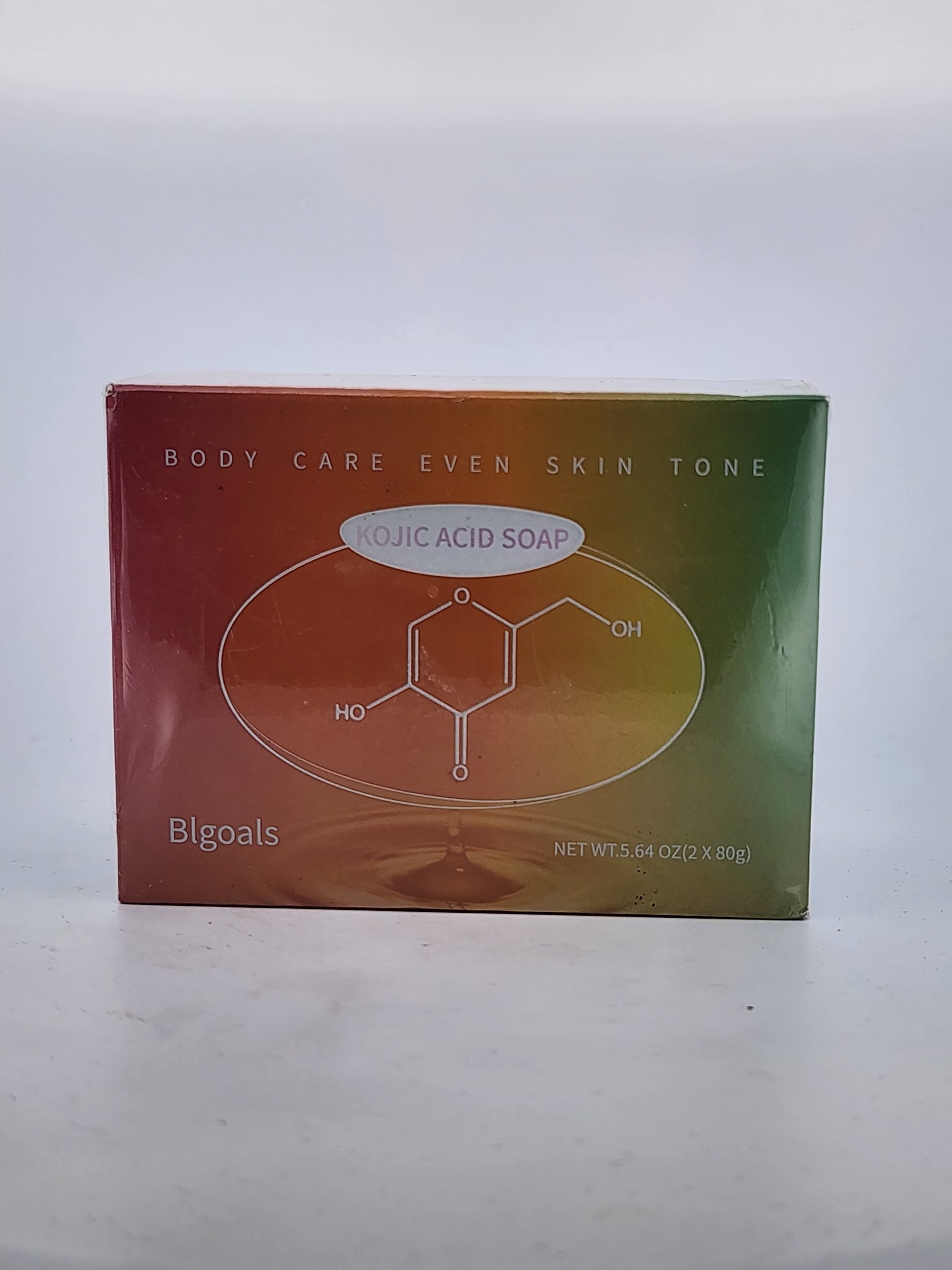 Box of body care soap with a focus on even skin tone on a white background
