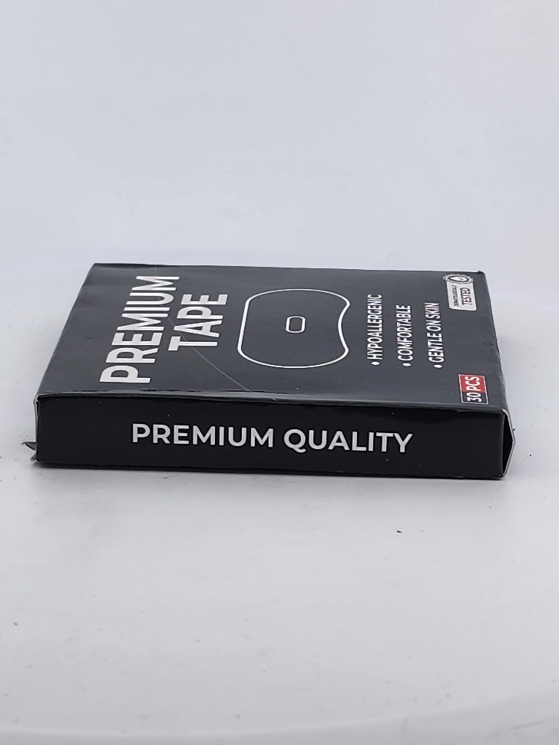 Black box labeled 'Premium Tape' with 'Premium Quality' on a white background