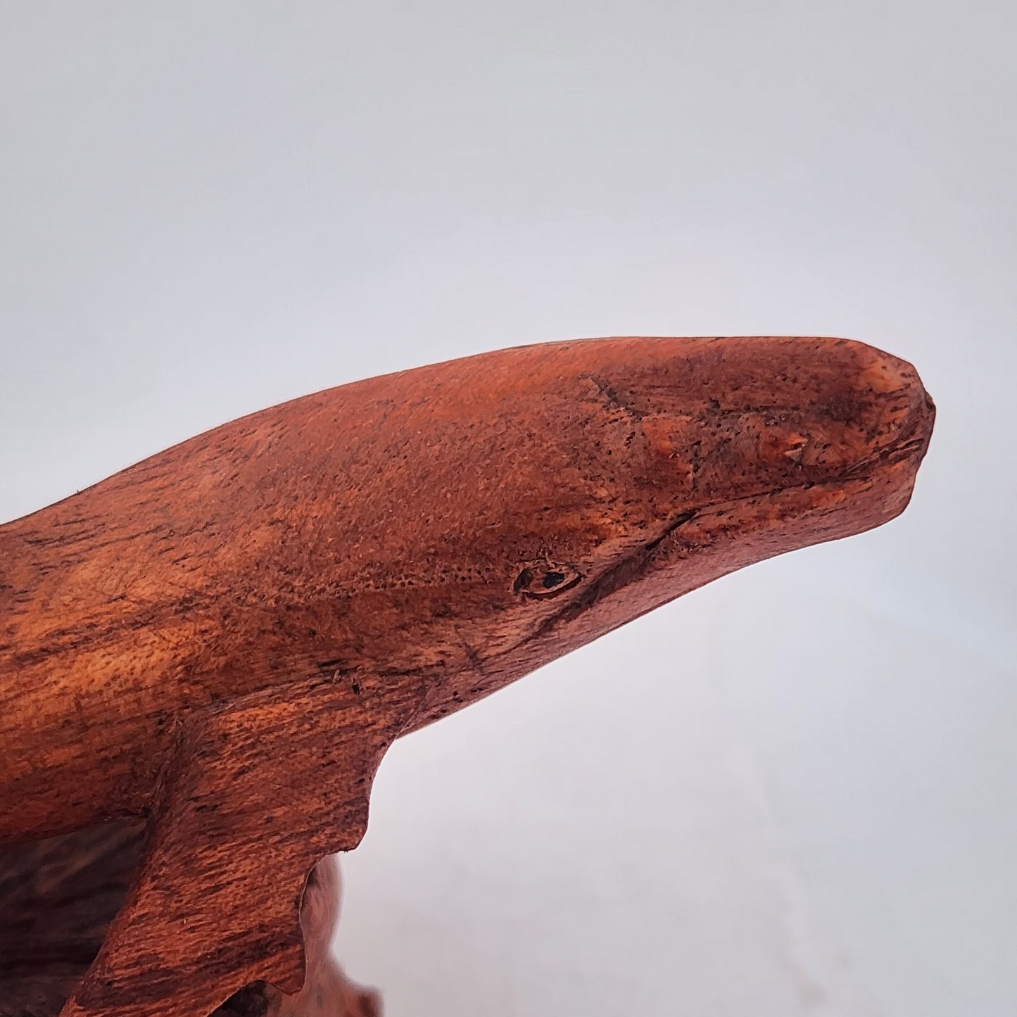 Wooden shark figurine on a white background