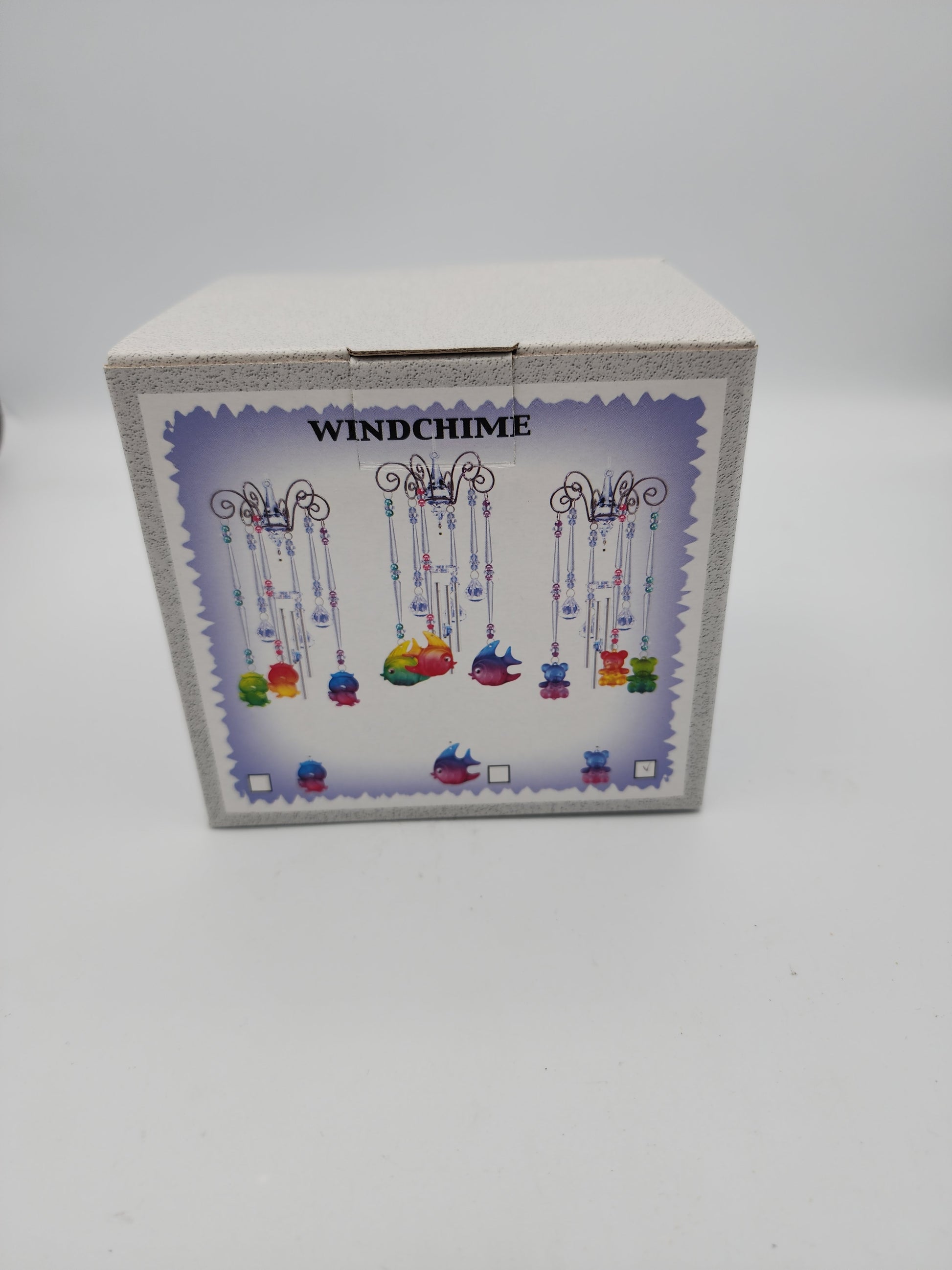 Decorative box with windchime design on a white background