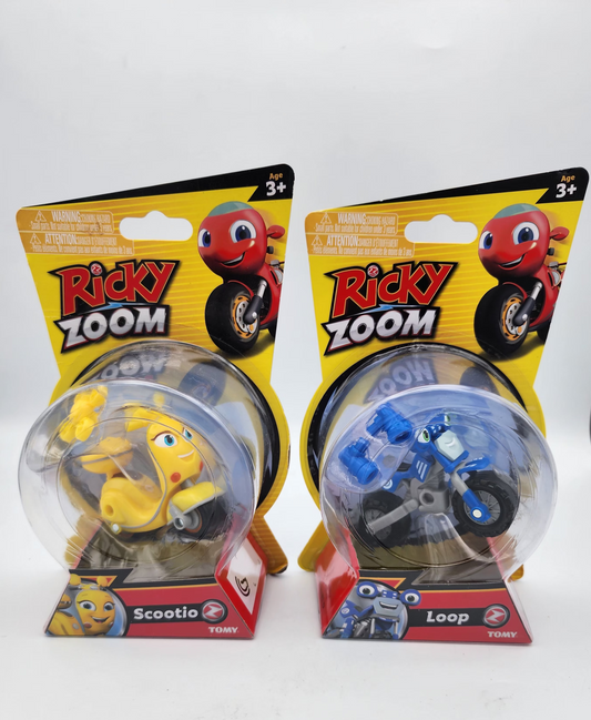 Two Ricky Zoom toy figures in packaging on a white background