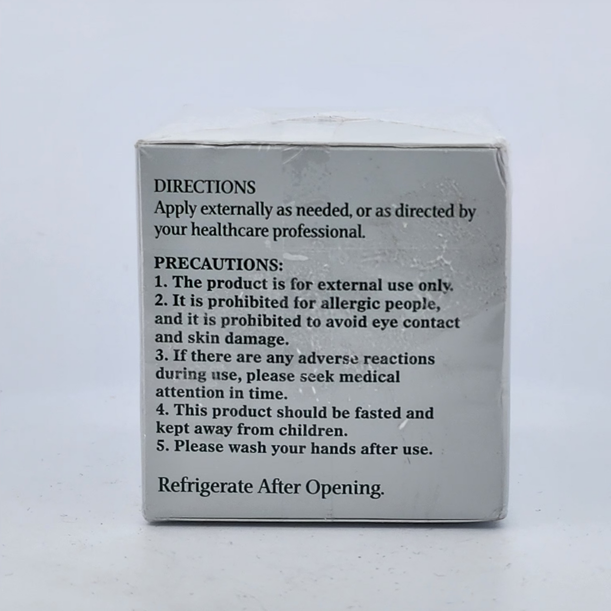 Back of a product packaging with directions and precautions on a white background